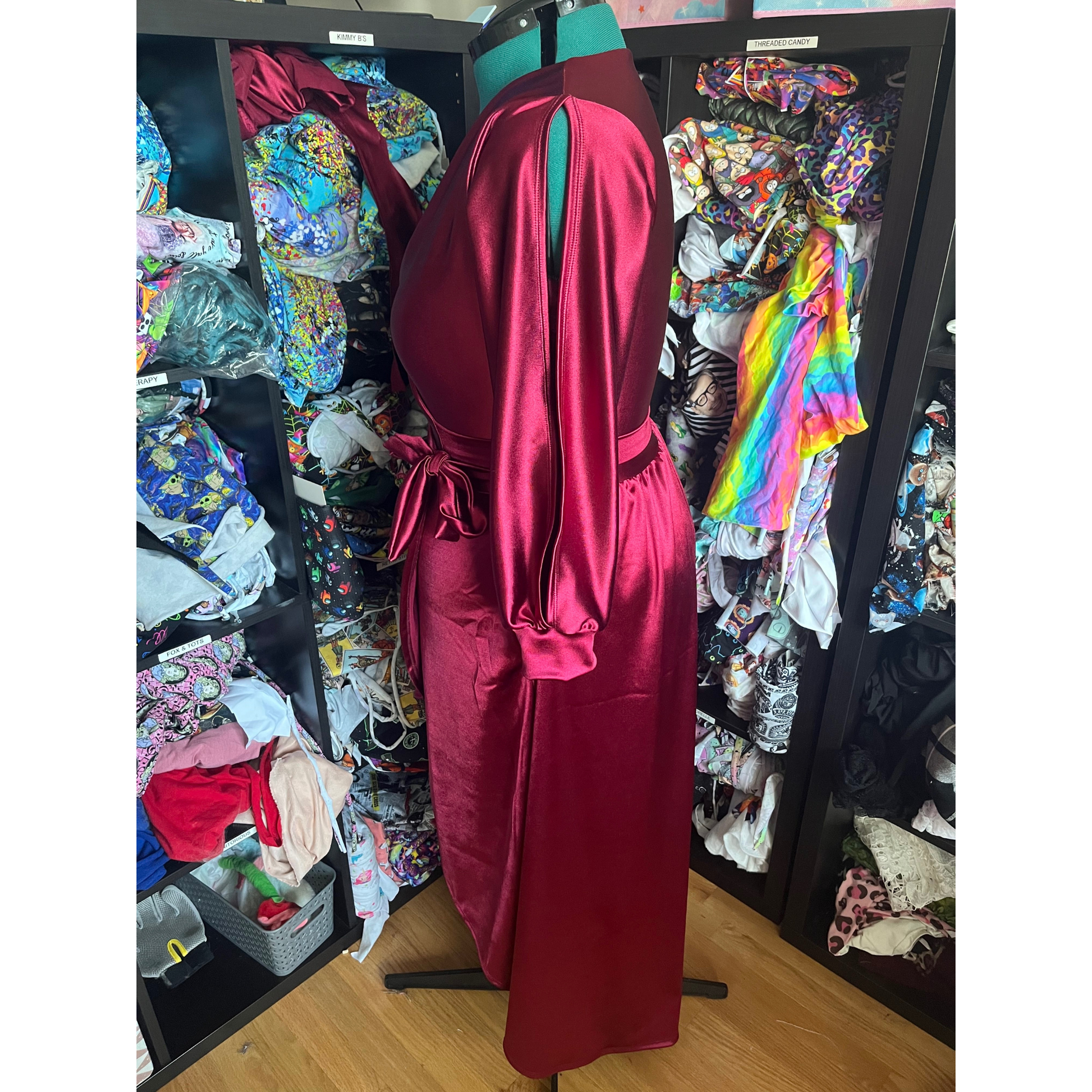 the Devin dress. satin wrap dress with slit sleeves. casstastrophe. shop casstastrophe. casstastropheshop.com. burgundy