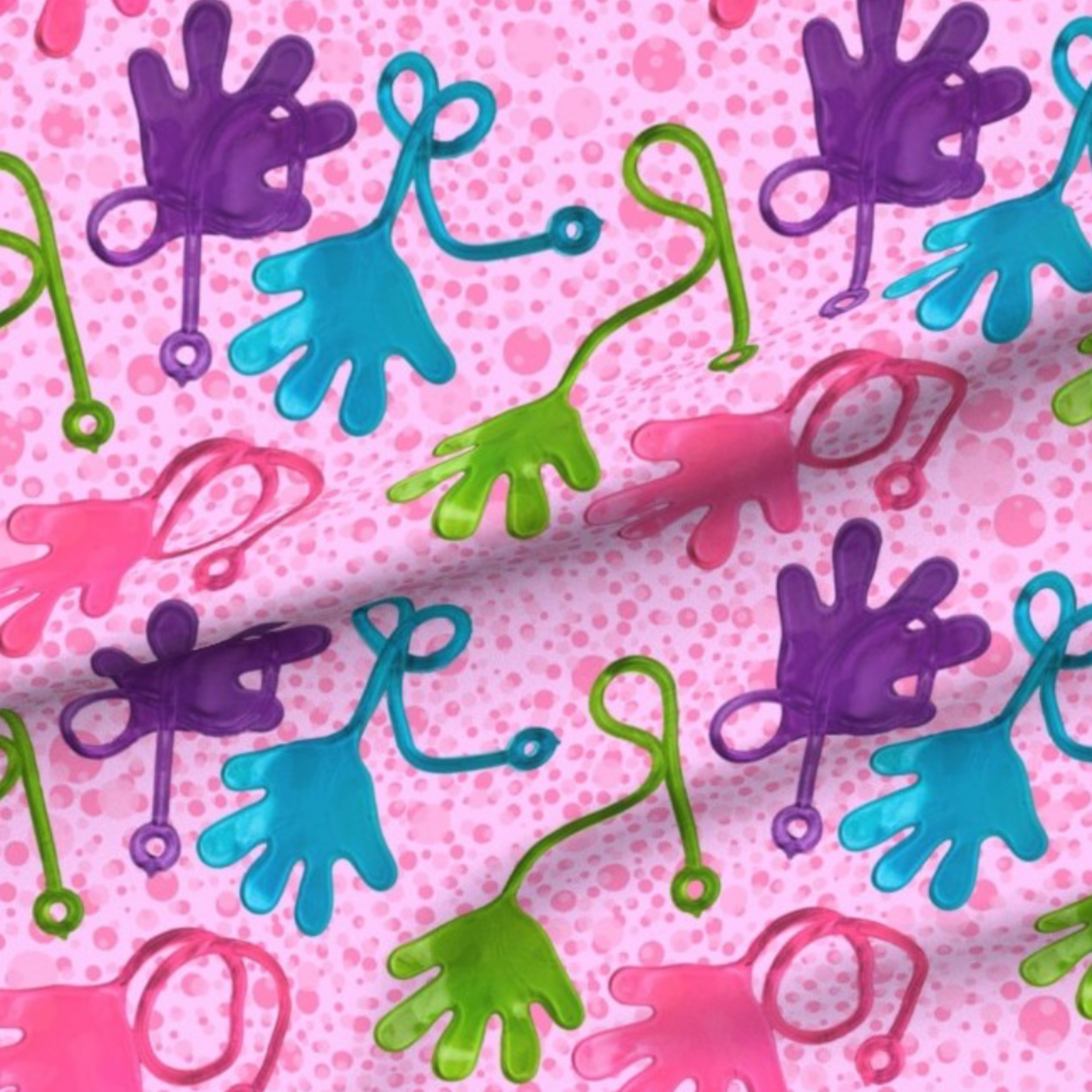 colorful sticky hands on a pink background