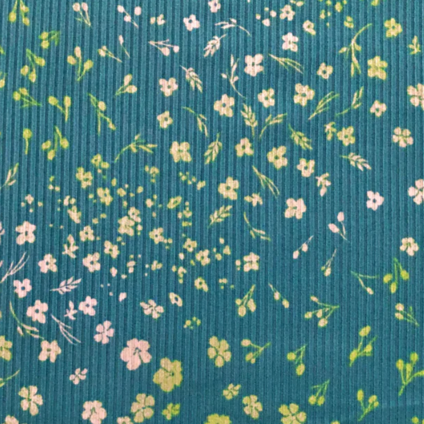 teal fabric with yellow and green flowers