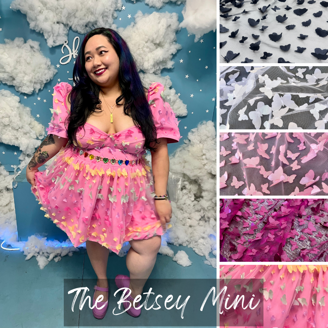 A woman models a pink mini dress with a ruffled skirt and butterfly print, standing in front of a blue cloud backdrop. The image includes a vertical strip of close-up fabric detail panels on the right and the text 'The Betsey Mini' at the bottom.