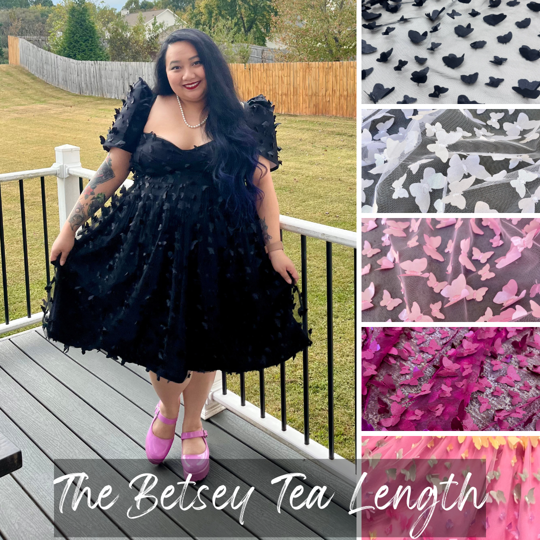 A woman stands on a wooden deck wearing a black tea-length ruffled dress with puff sleeves. The image includes four inset fabric close-ups on the right showing patterned textile options, and a text overlay reading 'The Betsey Tea Length'.