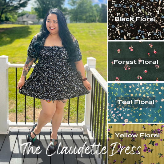 Woman wearing a floral dress standing on a deck in front of grass and trees with fabric swatches